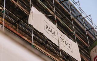 Banner der PAUL OPATZ Group am Objekt SPACE in der Bremer Überseestadt.