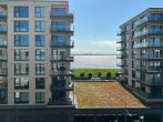Ausblick vom Balkon 2 - Hochwertig Wohnen mit maritimen Flair: Moderne 2-Zi.-Wohnung mit zwei Balkonen und Wasserblick